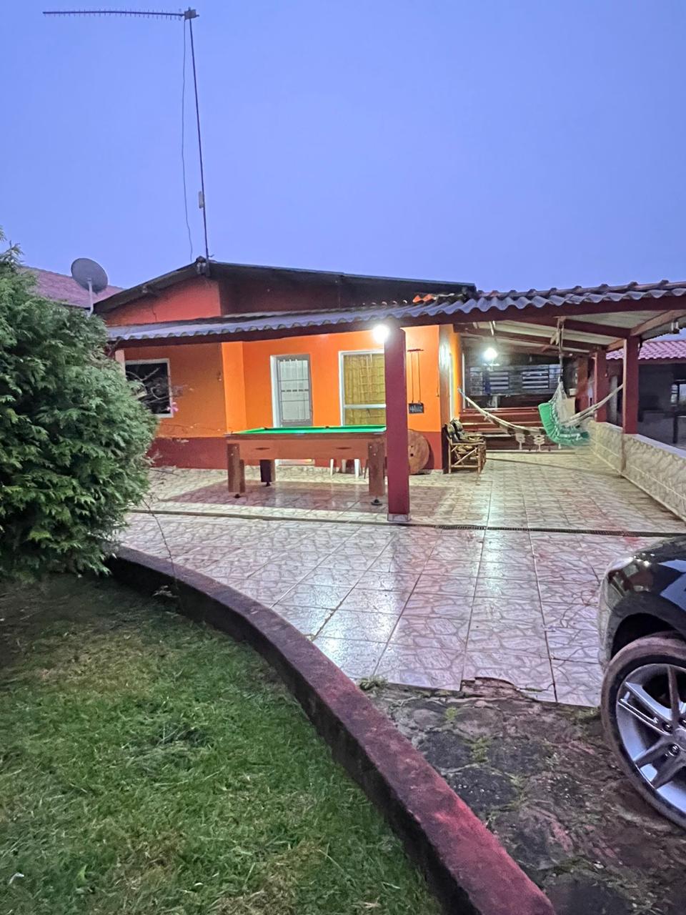 Belíssima chácara localizada em Munhoz, a 12 km da cidade com casa, piscina, pomar Cod. 1046