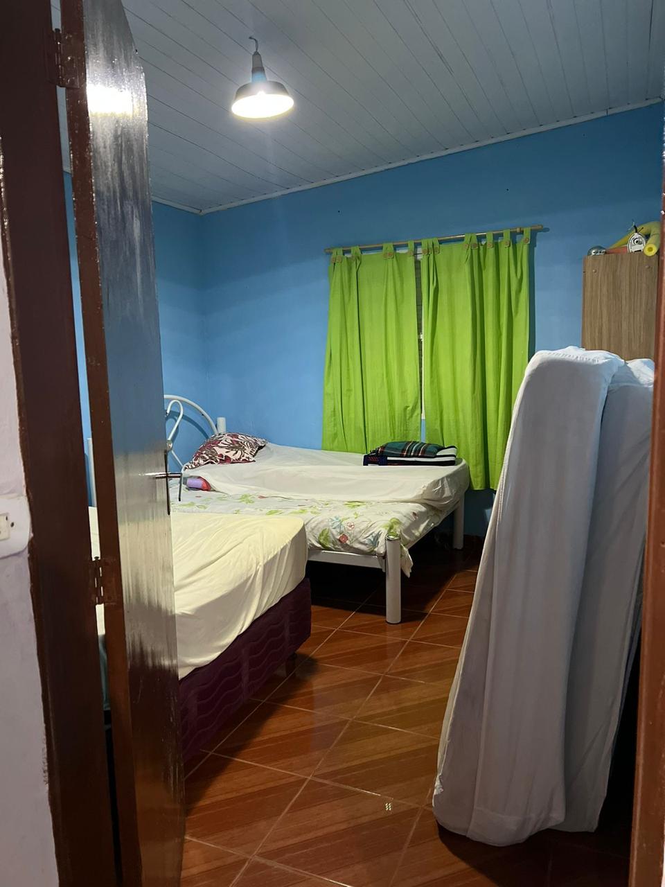 Belíssima chácara localizada em Munhoz, a 12 km da cidade com casa, piscina, pomar Cod. 1046